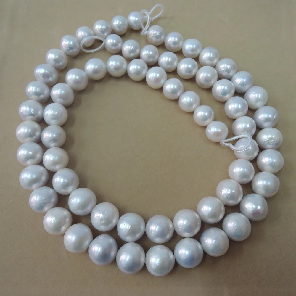 40 cm, saldūdens pērļu materiāls, ar apaļas formas -daba balta krāsa-12-15 mm, ideāli apaļas pērles Attēls 2