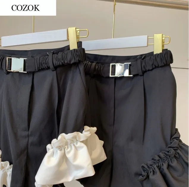 Ir 2021. Gudrs Vintage Sievietes Melnās Bikses Dāmas Augsta Vidukļa Ruffles Līnijas Izlīdzināšanu Visu maču Bikses Ar Jostas Femme Pantalones Cortos Attēls 1